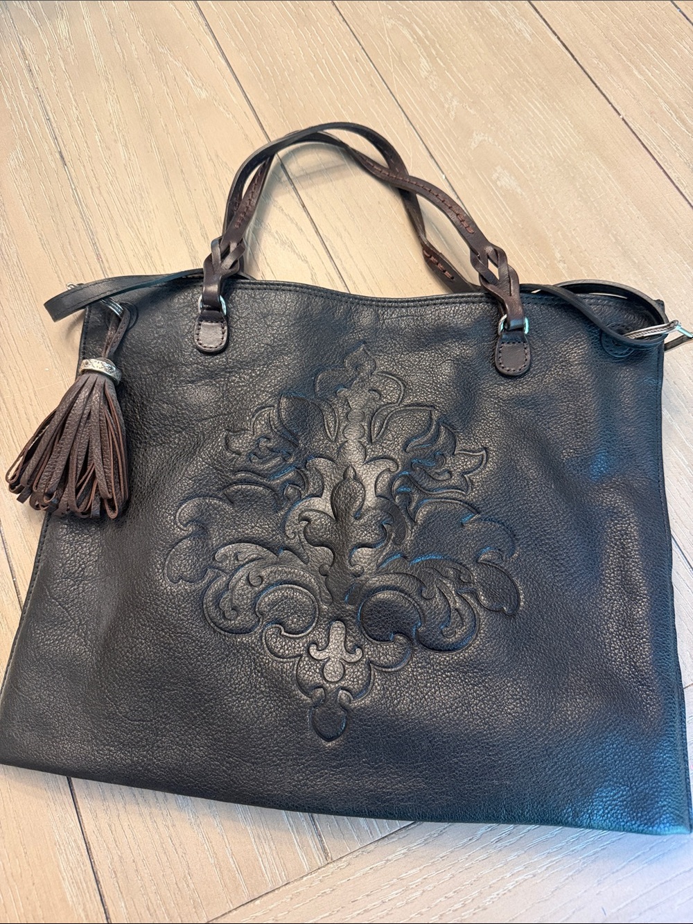 Brighton Black Leather Tote with Embossed Fleur-de-Lis and Brown Handles